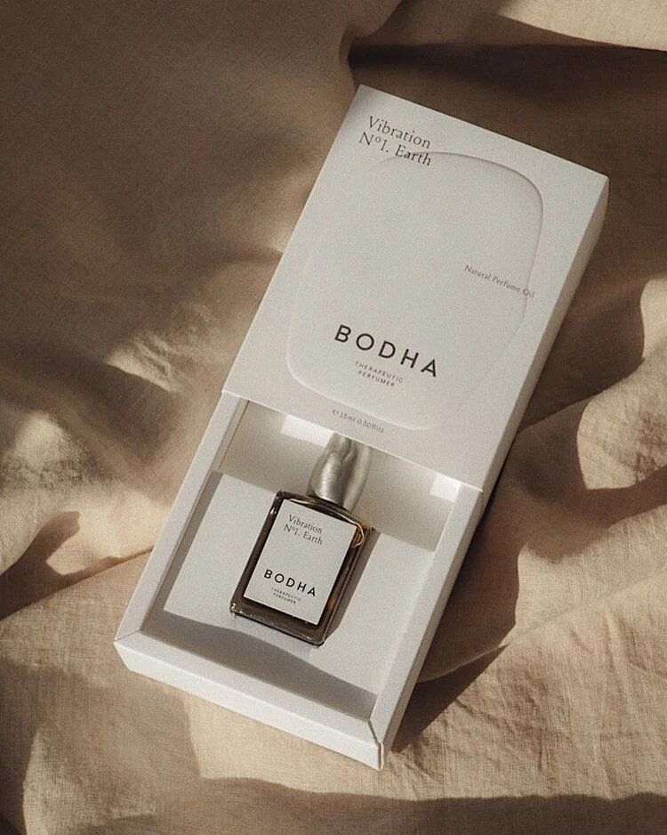 Eco-friendly stylishly designed foldable perfume gift box featuring embossed and gold-stamped