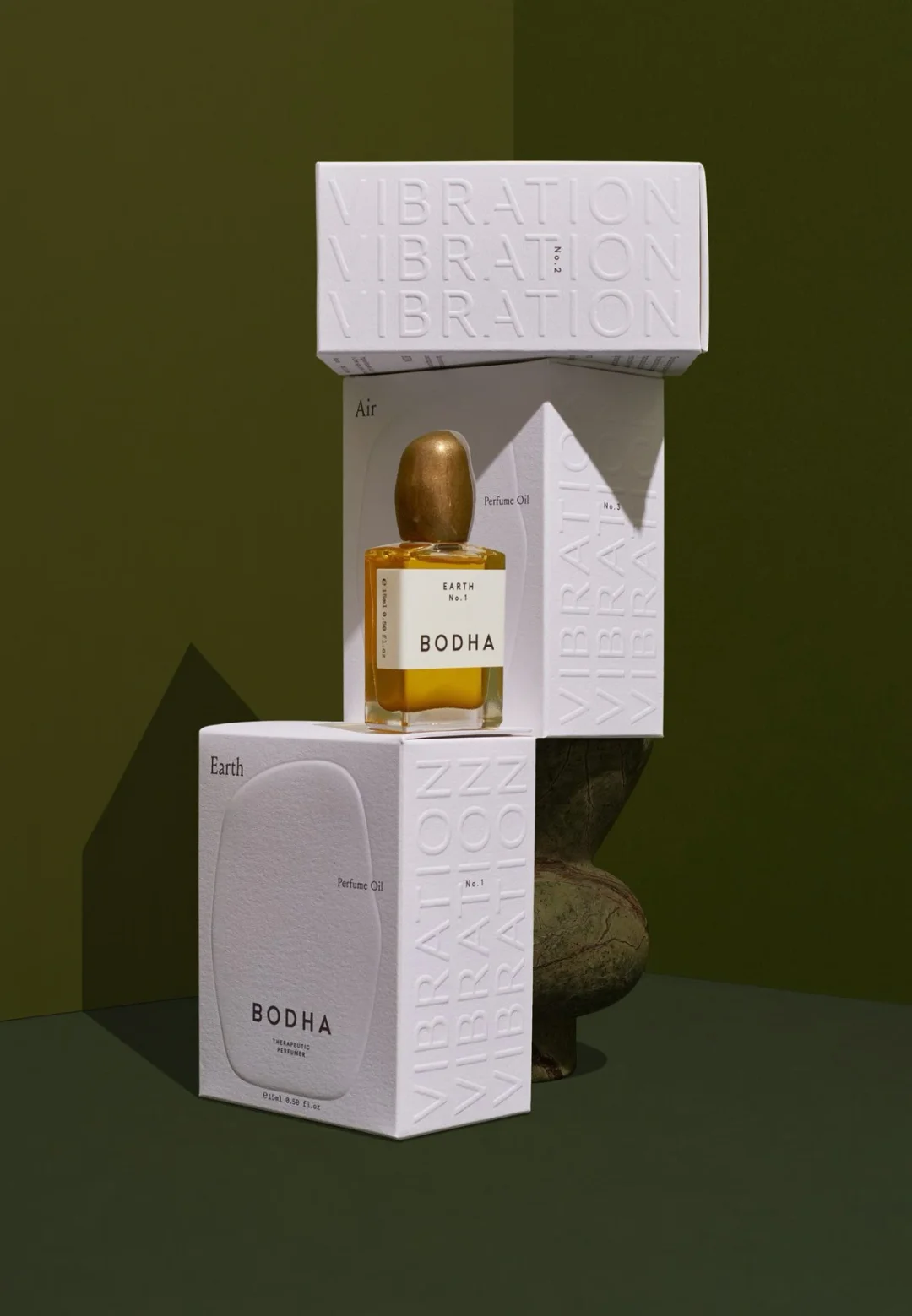Eco-friendly stylishly designed foldable perfume gift box featuring embossed and gold-stamped