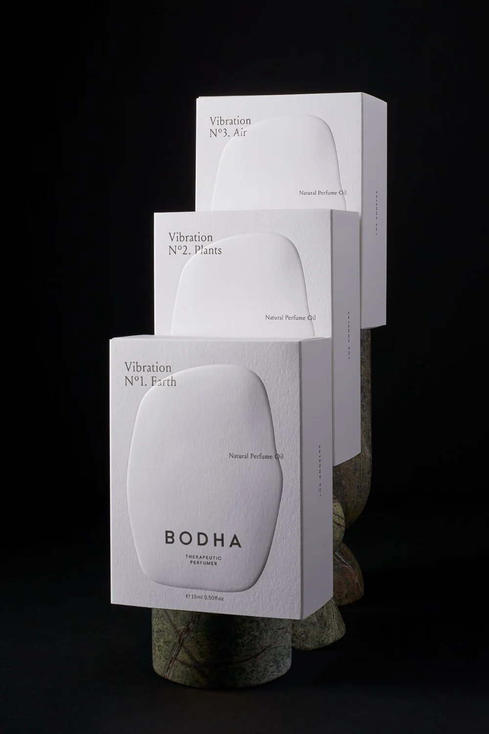 Eco-friendly stylishly designed foldable perfume gift box featuring embossed and gold-stamped